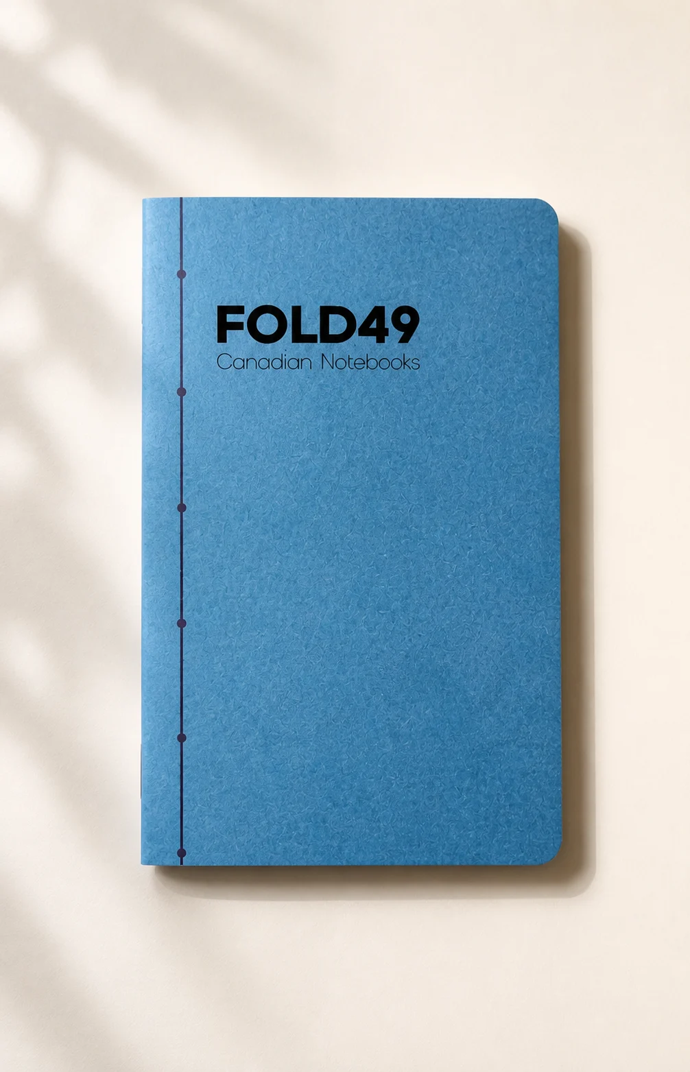 Blue FOLD49 standard pocket notebook with a Solid Core cover and parallel line motif