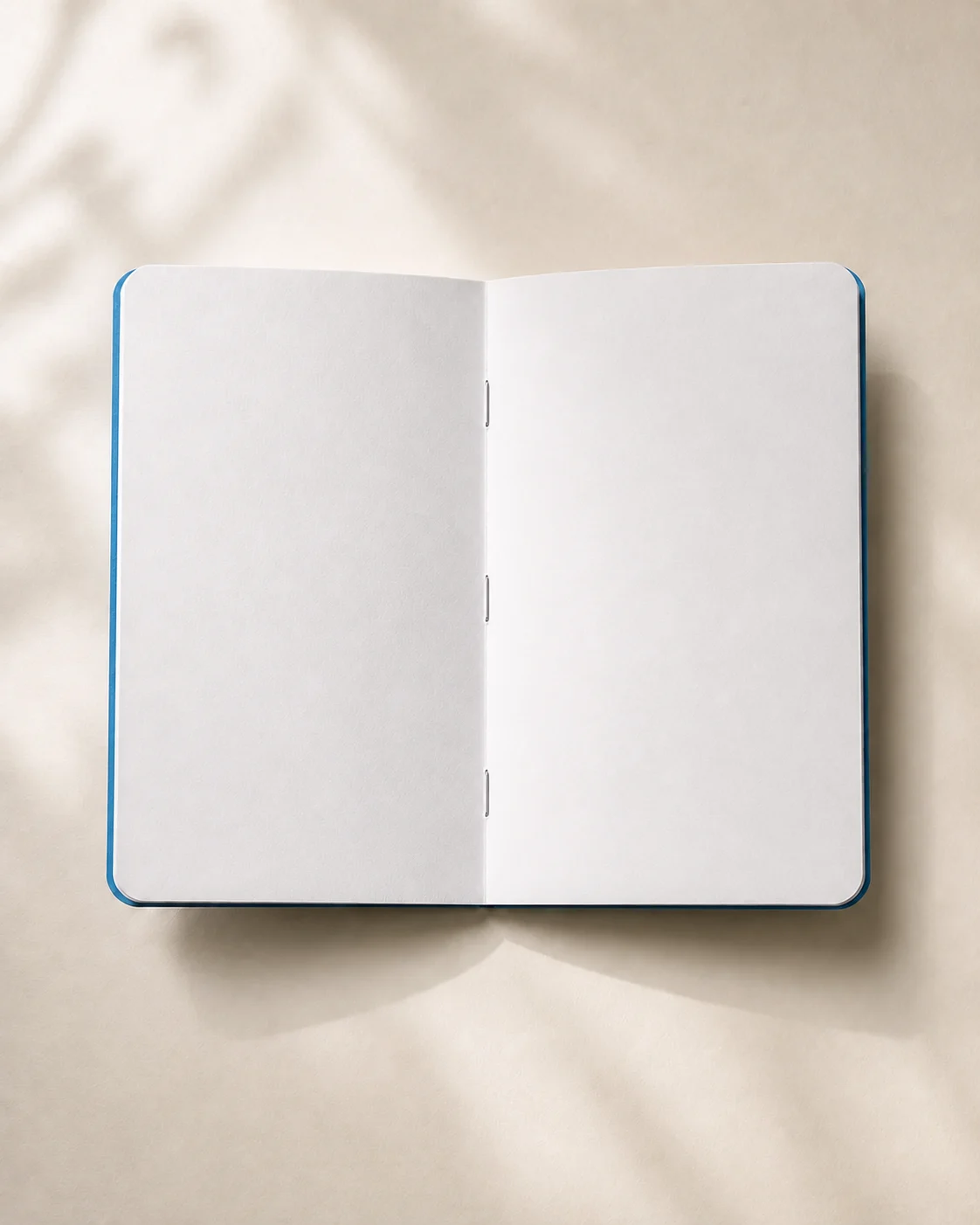 FOLD49 notebook opened to clean plain white 90 GSM paper